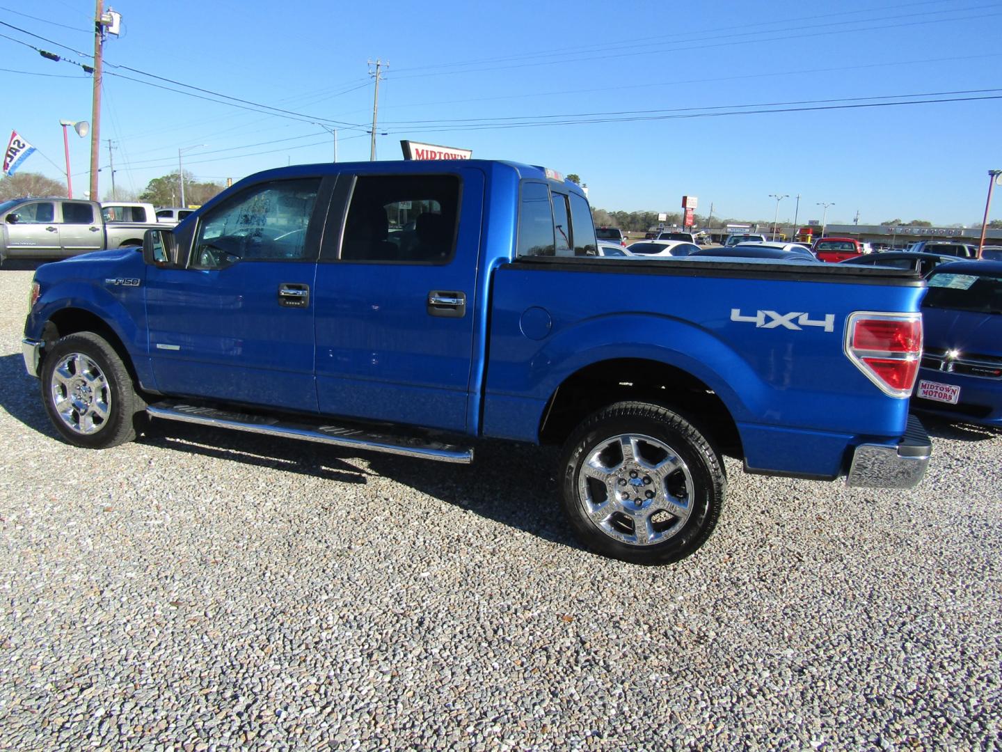 2013 Blue Ford F-150 XLT SuperCrew 6.5-ft. Bed 4WD (1FTFW1ET3DF) with an 3.5L V6 TURBO engine, Automatic transmission, located at 15016 S Hwy 231, Midland City, AL, 36350, (334) 983-3001, 31.306210, -85.495277 - Photo#5